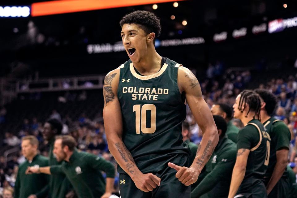 Colorado State guard Nique Clifford (10) celebrates during the second half of an NCAA college basketball game against Creighton Thursday, Nov. 23, 2023, in Kansas City, Mo. Colorado State won 69-48. (AP Photo/Charlie Riedel)