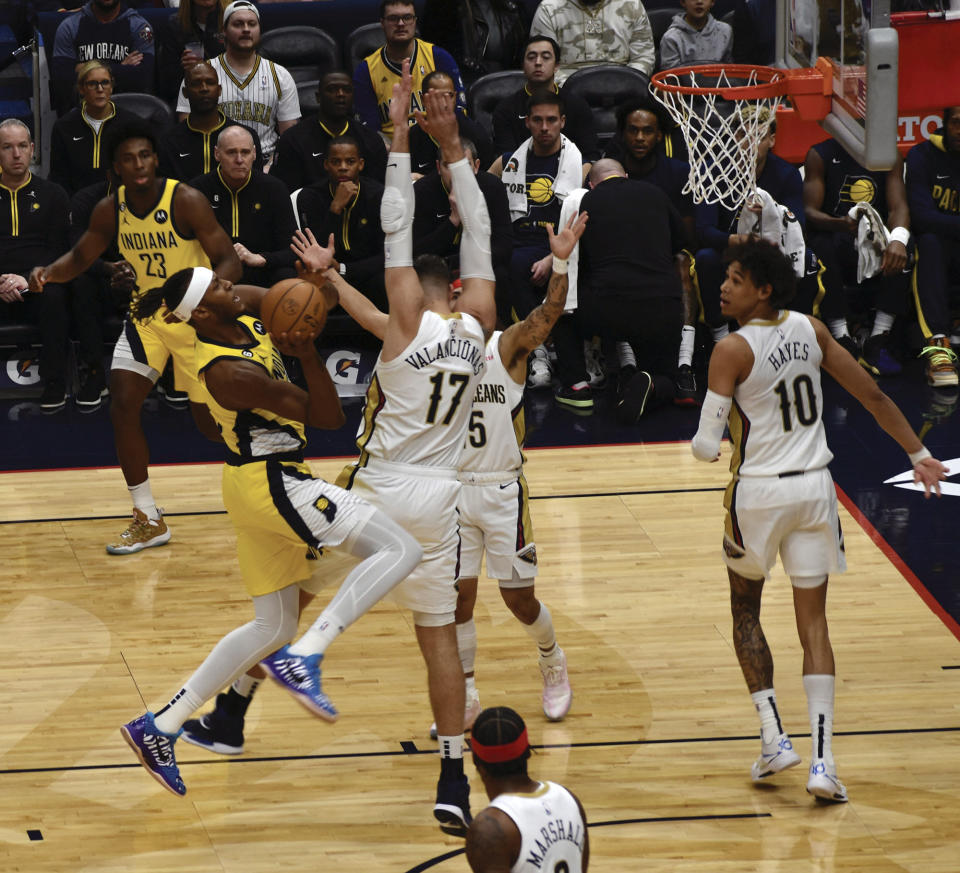Indiana Pacers center Myles Turner shoots in the paint against New Orleans Pelicans center Jonas Valanciunas during the first half of an NBA basketball game, Monday, Dec. 26, 2022 in New Orleans. (Aimee Cronan/The Gazebo Gazette via AP)