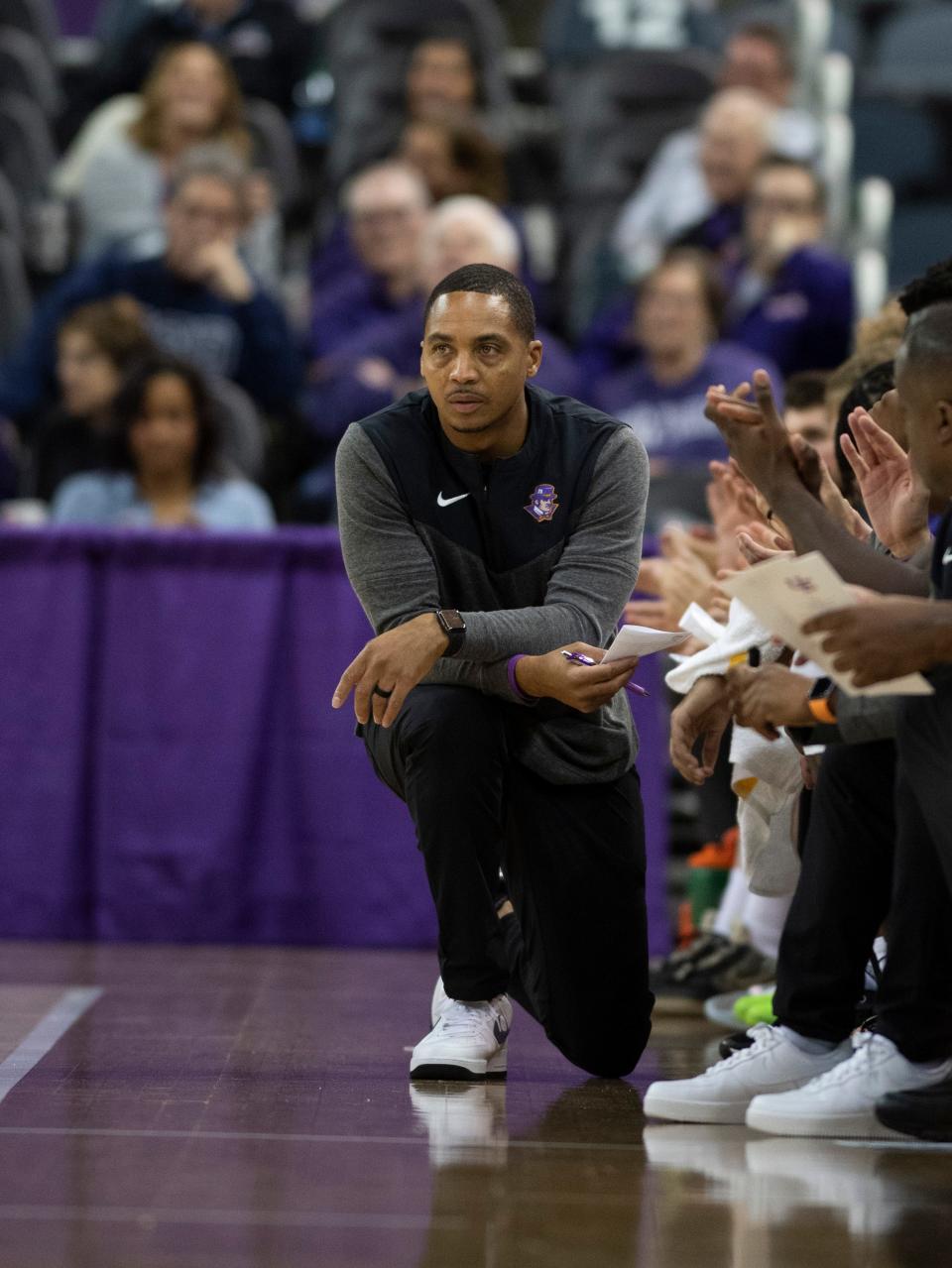 Evansville’s Head Coach David Ragland watches from the side as the University of Evansville Purple Aces play the Oakland City Mighty Oaks at Ford Center in Evansville, Ind., Saturday, Oct 29, 2022. 