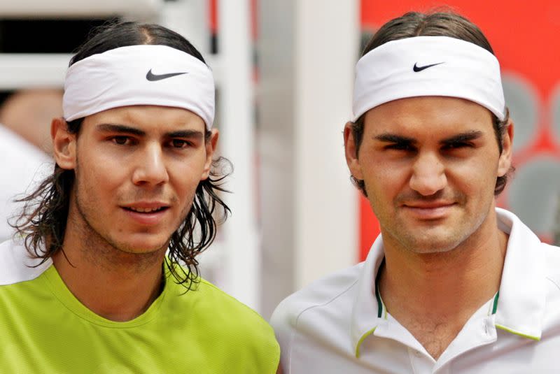 FILE PHOTO: Spain's Rafa Nadal and Switzerland's Roger Federer pose before their men's final match at the Rome Masters.