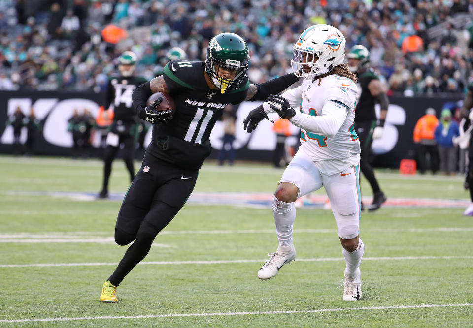 EAST RUTHERFORD, NEW JERSEY - DECEMBER 08:  Robby Anderson #11 of the New York Jets in action against Ryan Lewis #24 of the Miami Dolphins during their game at MetLife Stadium on December 08, 2019 in East Rutherford, New Jersey. (Photo by Al Bello/Getty Images)