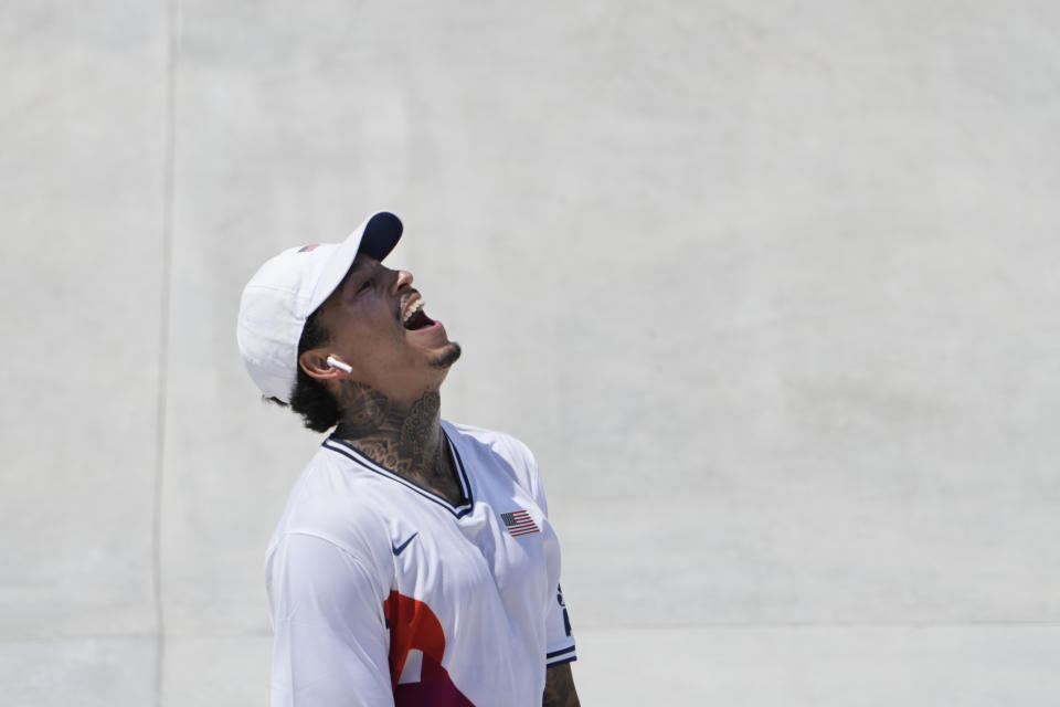 Nyjah Huston of the United States reacts after his skate during the men's street skateboarding finals at the 2020 Summer Olympics, Sunday, July 25, 2021, in Tokyo, Japan. (AP Photo/Jae C. Hong)