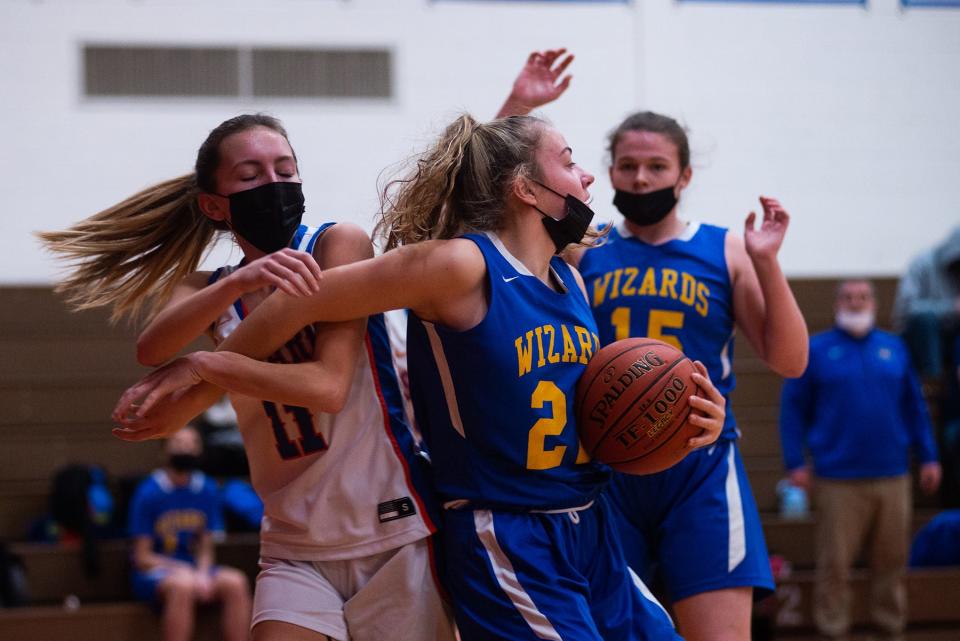 Washingtonville's Kathryn Argenzio, right, fends off S.S. Seward's Kassidy DeGroat during a McGinnis tournament semifinal on Saturday, won by Seward 50-47. Seward moved up one spot in the Varsity 845 rankings. KELLY MARSH/For the Times Herald-Record