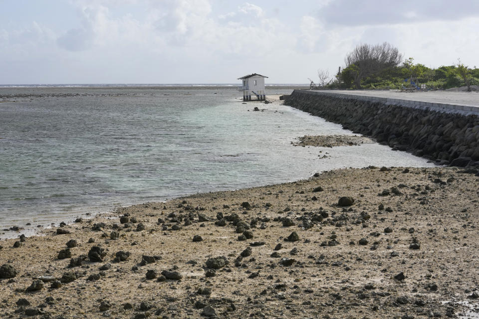 An abandoned structure is seen at the Philippine-occupied Thitu island, locally called Pag-asa island, on Friday, Dec. 1, 2023 at the disputed South China Sea. The Philippine coast guard inaugurated a new monitoring base Friday on a remote island occupied by Filipino forces in the disputed South China Sea as Manila ramps up efforts to counter China's increasingly aggressive actions in the strategic waterway. (AP Photo/Aaron Favila)