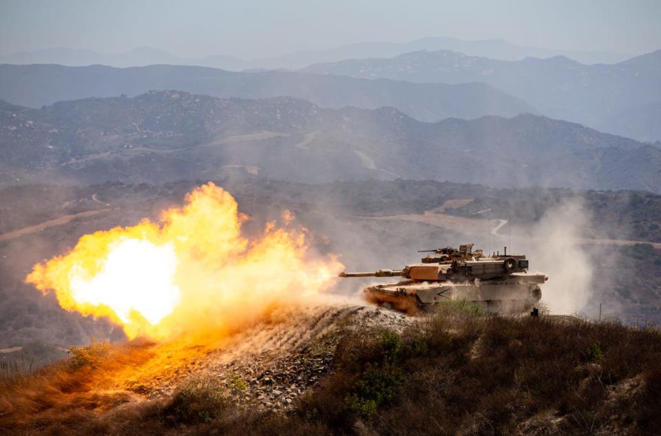 An M1A2 Abrams Main Battle Tank fires during the Tank Gunnery Competition, TIGERCOMP on Marine Corps Base Camp Pendleton, August 29, 2019.