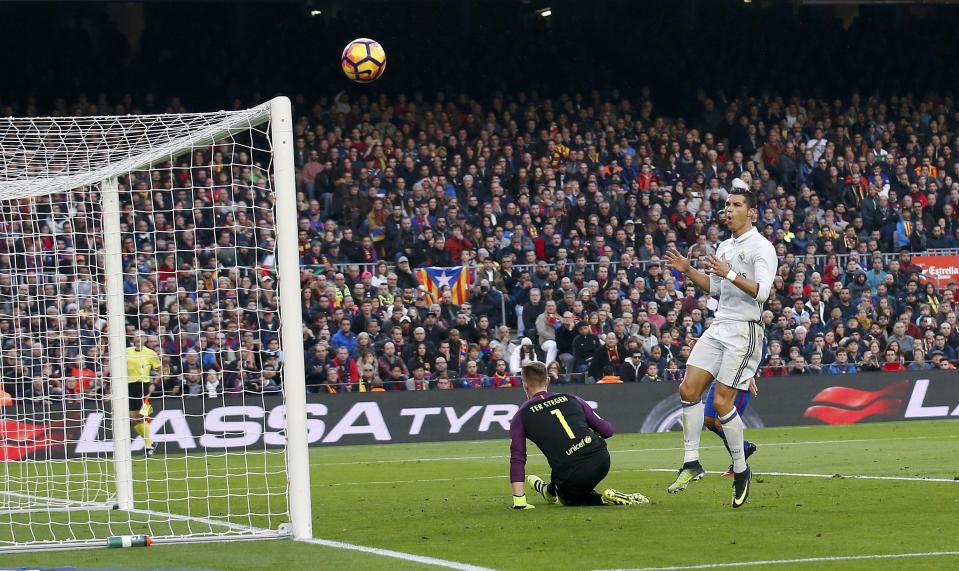 Football Soccer - Barcelona v Real Madrid - Spanish La Liga Santander- Nou Camp Stadium, Barcelona, Spain - 3/12/16. Real Madrid's Cristiano Ronaldo reacts after Barcelona's goalkeeper Ter Stegen stopped a shot on goal during the "Clasico". REUTERS/Albert Gea