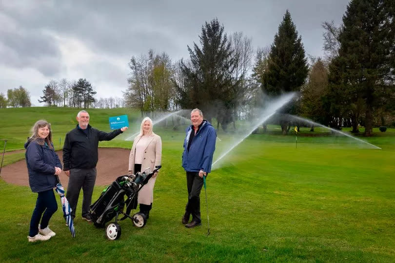 Pictured with the club's new borehole-supplied sprinklers are, from left, Lady vice-captain Nia Davies, club chairman Ian Vaughan Evans, Marian Jones, of the Wind Farm Fund, and club secretary John Carrington