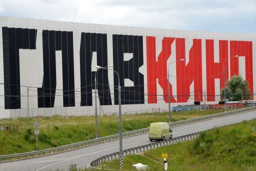 A van pass by a Glavkino film studios sign located outside Moscow. The Russian company has spent $89mn building eastern Europe's largest production facilities in a field outside Moscow and hopes to lure Hollywood majors to shoot and produce movies