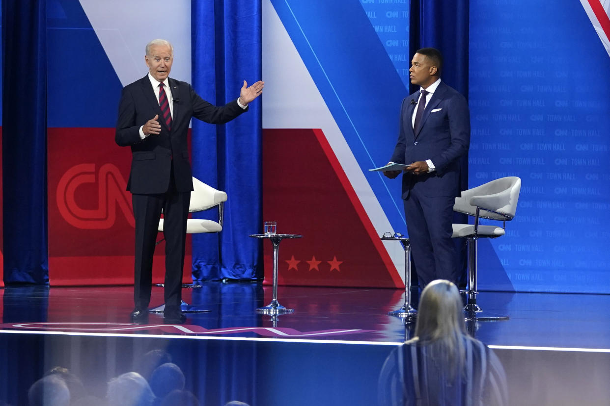 President Joe Biden, accompanied by CNN journalist Don Lemon, right, speaks at CNN town hall at Mount St. Joseph University in Cincinnati, Wednesday, July 21, 2021. (AP Photo/Andrew Harnik)