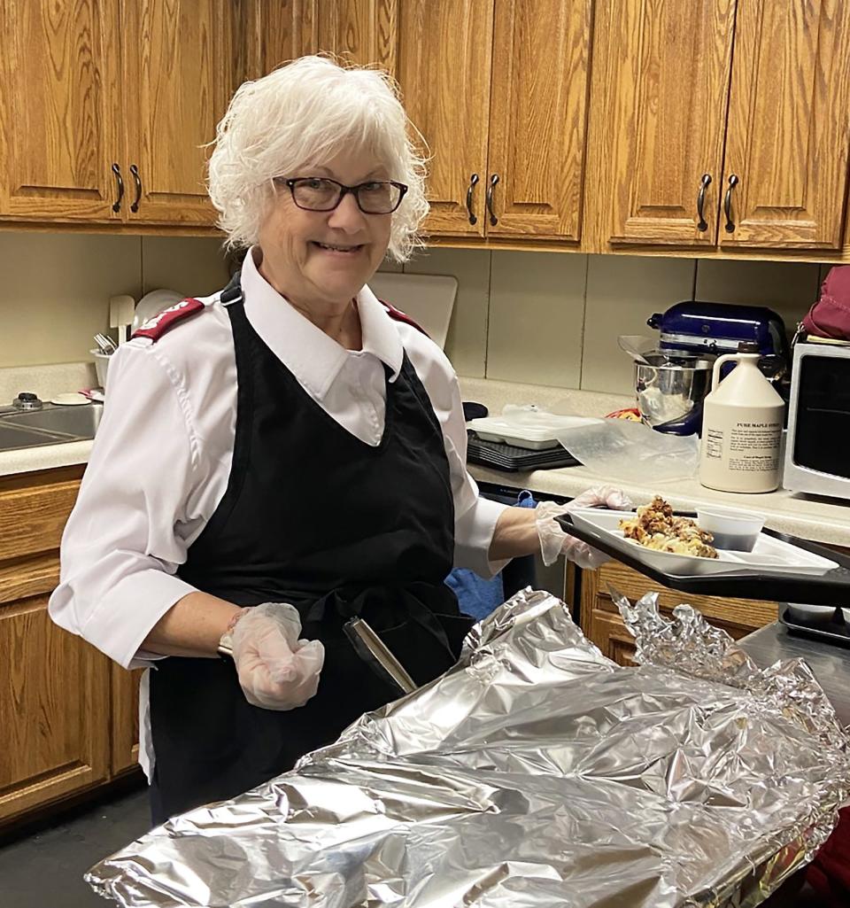 Major Sally Sell serves up lunch at The Salvation Army in Sturgis.