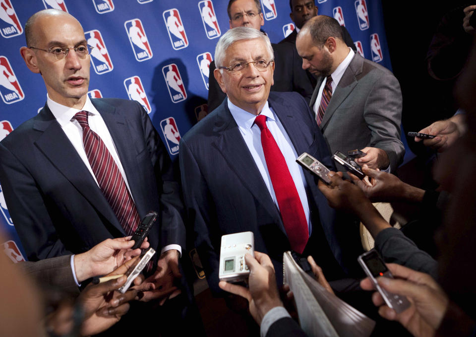 Adam Silver (L), Deputy NBA Commissioner at the time (now the commissioner), and David Stern, then the NBA Commissioner, at a press conference in 2011. (AP/John Minchillo)