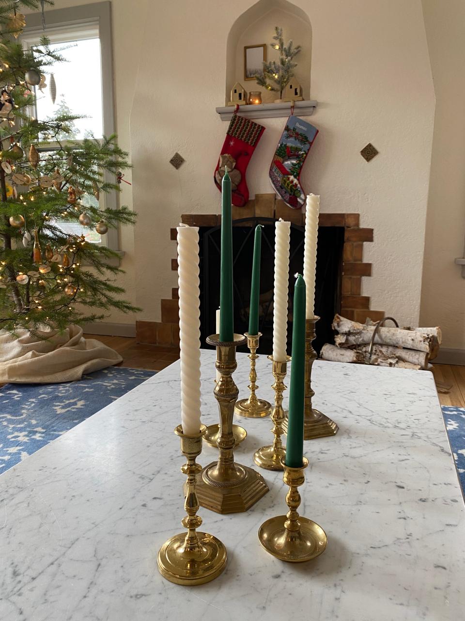 Vintage candlesticks with festive tapers make a simple statement.