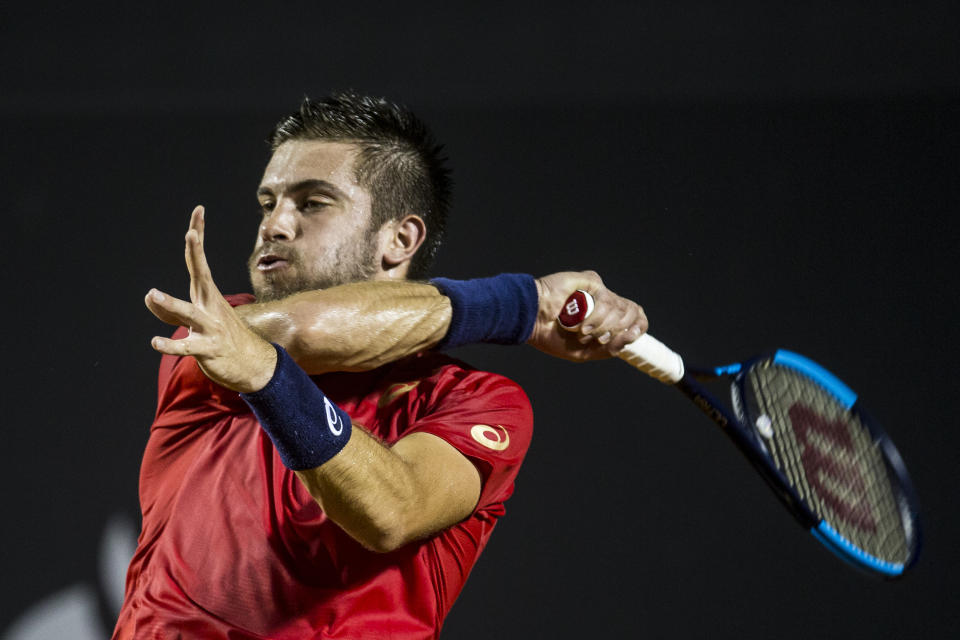 Croatia's Borna Coric returns the ball during his ATP World Tour Rio Open 2020. 