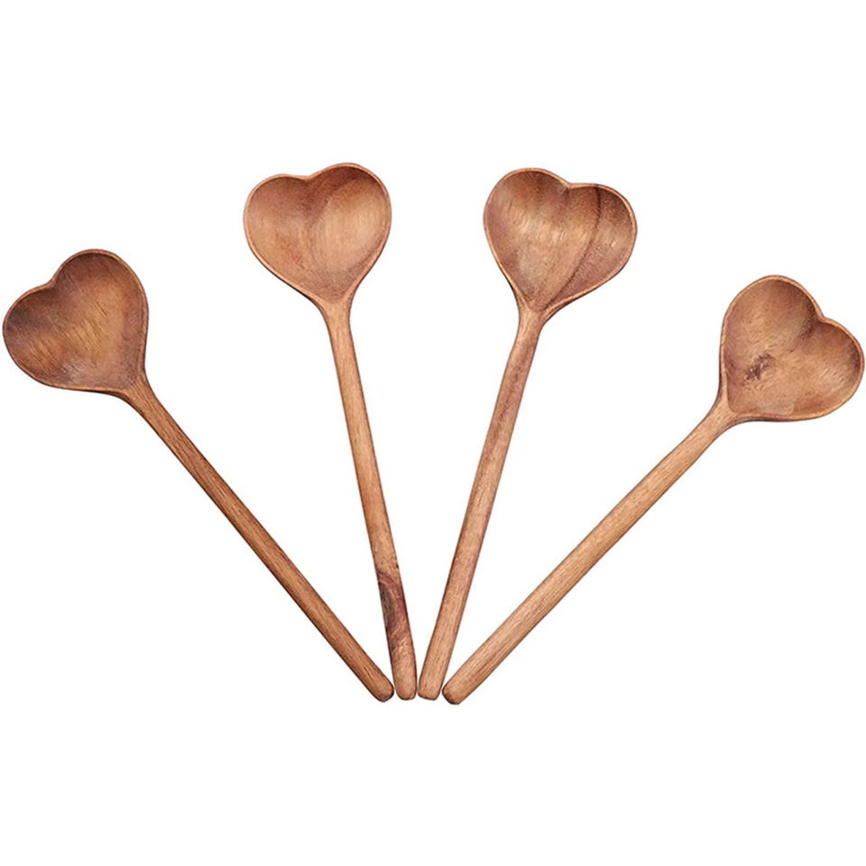 <p><a href="https://go.redirectingat.com?id=74968X1596630&url=https%3A%2F%2Fwww.walmart.com%2Fip%2FWashranp-Wooden-Spoon-with-Long-Handle-Anti-Crack-Heat-Resistance-Heart-Shaped-Safe-Spoon-for-Kitchen-Gadget%2F2050016782&sref=https%3A%2F%2Fwww.womansday.com%2Flife%2Fg971%2Fgifts-under-20-dollars%2F" rel="nofollow noopener" target="_blank" data-ylk="slk:Shop Now;elm:context_link;itc:0;sec:content-canvas" class="link ">Shop Now</a></p><p>Heart Shaped Wooden Spoon</p><p>walmart.com</p><p>$10.08</p><span class="copyright">Washranp</span>