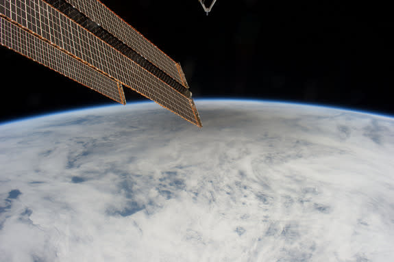 This is one of a series of photos taken by Expedition 31 Flight Engineer Don Pettit aboard the International Space Station, showing a shadow of the moon created by the May 20, 2012 solar eclipse, as the shadow spreads across cloud cover on Eart