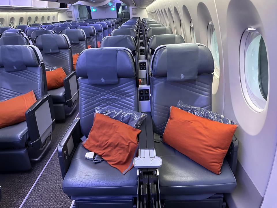 A front view of premium economy seats on a Singapore Airlines Airbus A350ULR