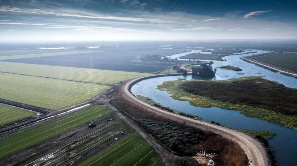 White Slough in the Sacramento-San Joaquin Delta meanders past the Zuckerman Family Farms in a drone image from Tuesday, Nov. 1, 2022.. The farm grows potatoes, grapes and other crops.