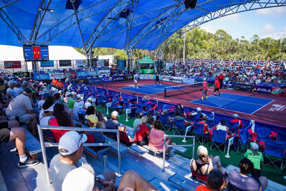 People attend the seventh annual Minto U.S. Open Pickleball Championships at East Naples Community Park in Naples on Monday, April 17, 2023.
