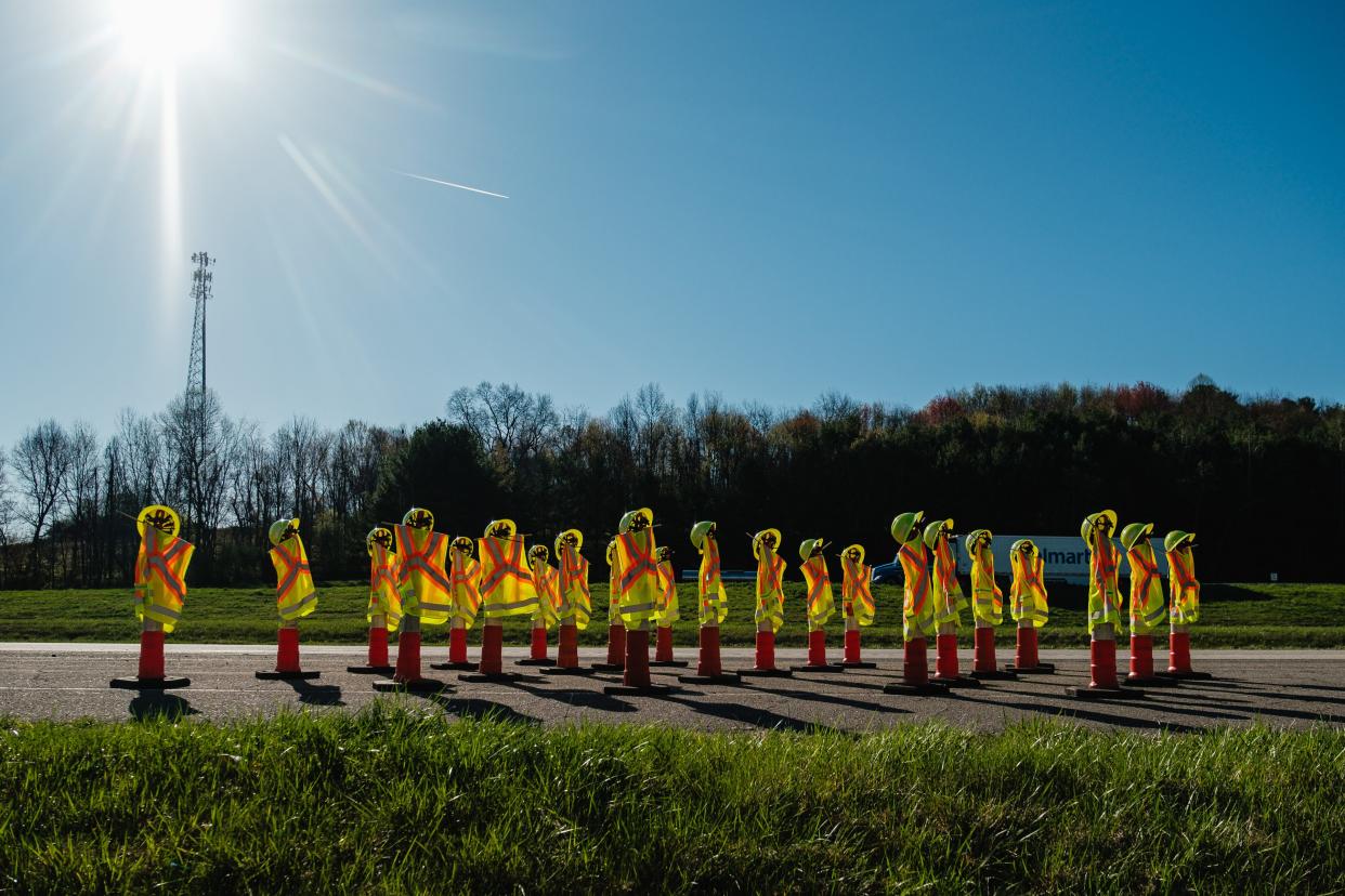 A work zone safety display created by the Ohio Department of Transportation is seen along I-77 in northern Tuscarawas County during National Work Zone Awareness Week, Tuesday, April 16. The cones represent the numbers of workers killed in 2023, according to ODOT.