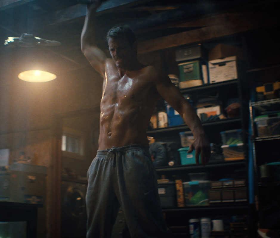 Joel Kinnaman performing kettlebell bottoms-up press.<p>Courtesy of Lionsgate</p>