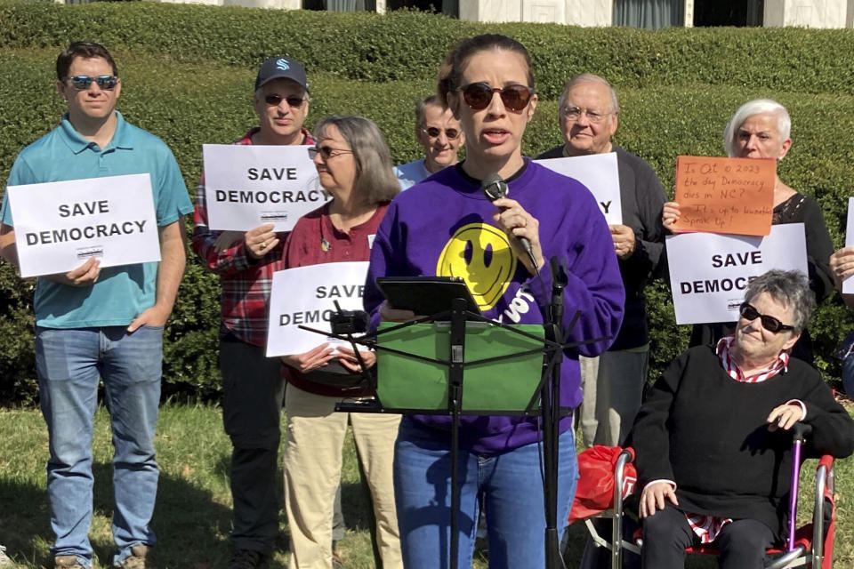 Joselle Torres, with Democracy North Carolina, an election and voter advocacy group, speaks at a news conference outside the Legislative Building in Raleigh, N.C., Tuesday, Oct. 10, 2023. Torres and other speakers urged lawmakers to uphold the vetoes of Democratic Gov. Roy Cooper on several bills. One would shift the power to appoint State Board of Elections members from the governor to legislative leaders, while another would end a three-day grace period to receive and count absentee ballots as long as they are postmarked by Election Day. (AP Photo/Gary D. Robertson)