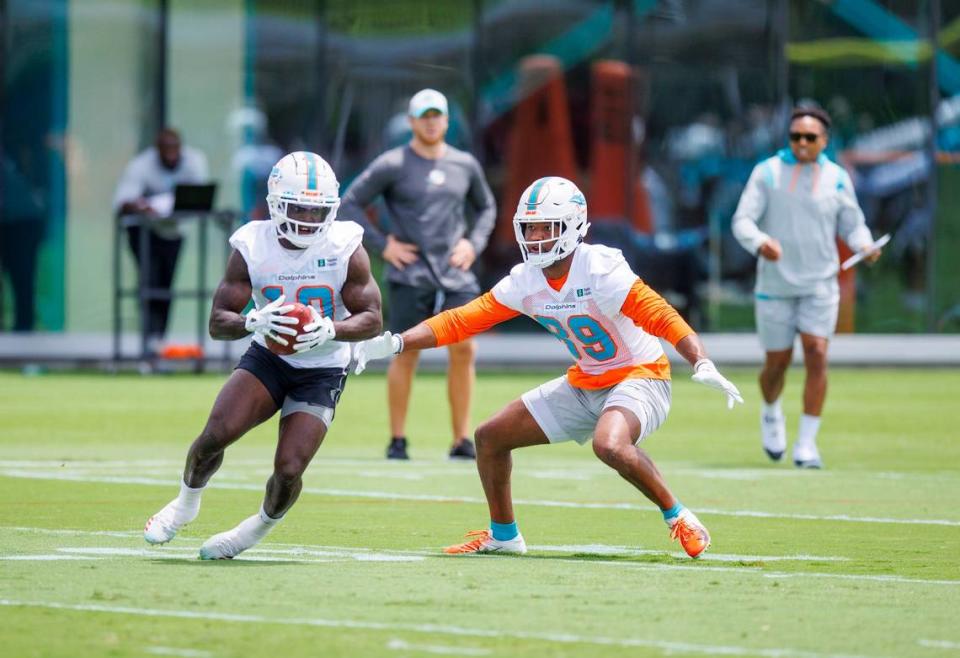 Miami Dolphins wide receivers Tyreek Hill (10) and Cody Core (89) participate in drills during the NFL football team’s organized team activities at Baptist Health Training Complex in Hard Rock Stadium on Tuesday, May 24, 2021 in Miami Gardens, Florida, in preparation for their 2022-23 NFL season.