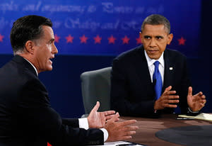 Mitt Romney,  President Barack Obama | Photo Credits: Rick Wilking-Pool/Getty Images