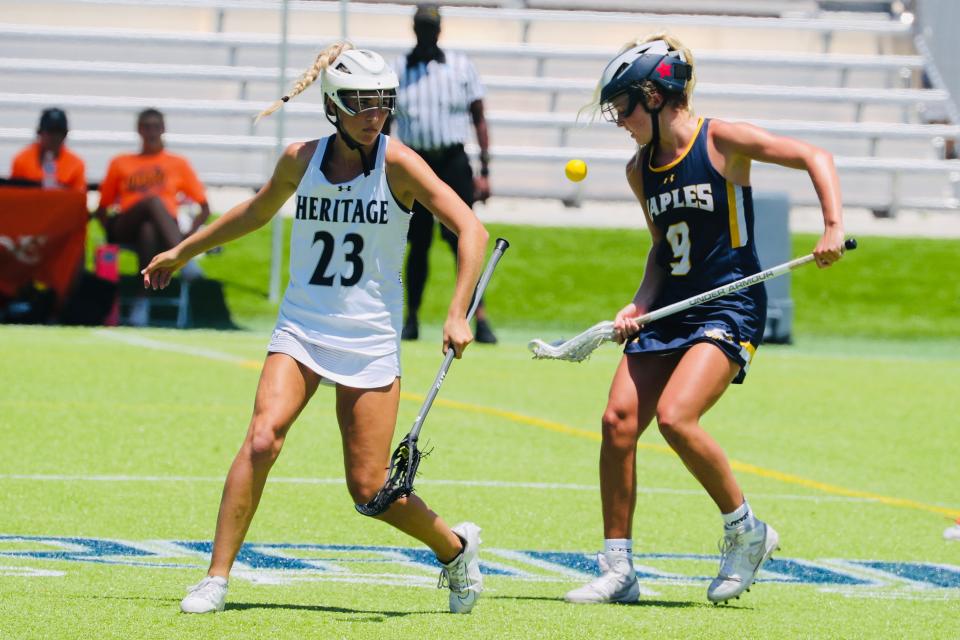 American Heritage junior Alexandra Dorr (23) chases down the ball against a Naples foe in the Stallions' state semifinal win on May 6, 2022 in Naples.