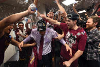<p>The Loyola Chicago Ramblers head coach Porter Moser gets doused with water in the locker room following the team’s victory over the Kansas State Wildcats in the fourth round of the 2018 NCAA Men’s Basketball Tournament held at Philips Arena on March 24, 2018 in Atlanta, Georgia. (Photo by Brett Wilhelm/NCAA Photos via Getty Images) </p>