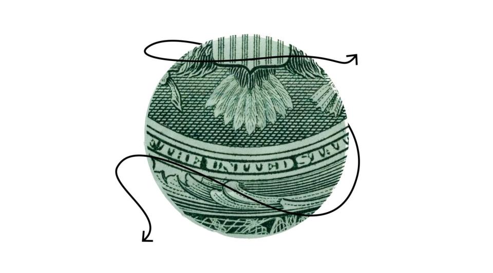 A circular cutout from a dollar bill encircled by arrows.