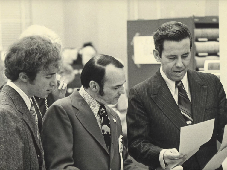 One of Mitch Daniels' first jobs in politics was on the staff of then-Indianapolis Mayor Richard Lugar. Here, Daniels (left) is working with Lugar (right) as an aide in 1971.