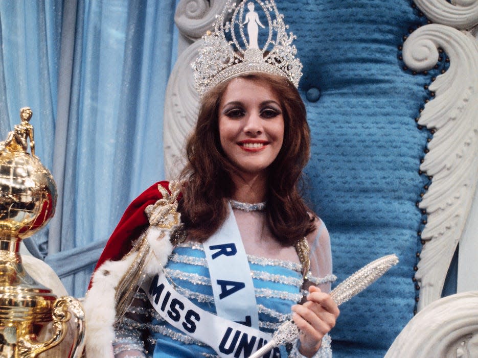 Miss Universe of 1968, Martha Yasconcellos of Brazil, has received her trophy here. She was named over 64 other beauties from around the world on July 13th.