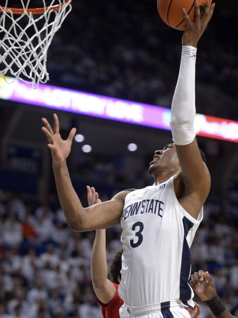 Penn State's Kebba Njie (3) shoots left-handed against Rutgers during the first half of an NCAA college basketball game, Sunday, Feb. 26, 2023, in State College, Pa. (AP Photo/Gary M. Baranec)