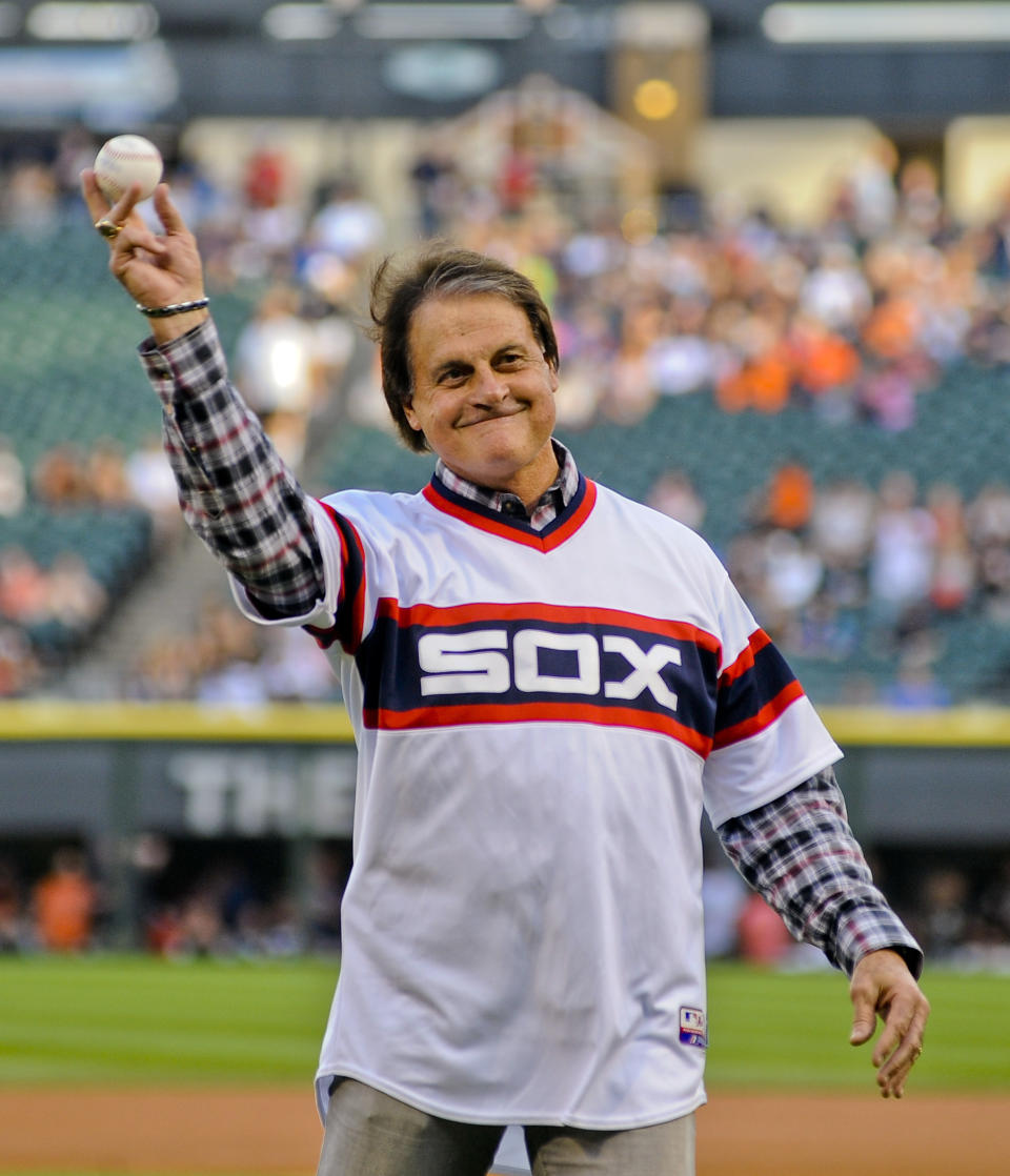 FILE - In this Aug. 30, 2014, file photo, former Chicago White Sox manager Tony La Russa throws out a ceremonial first pitch before the second baseball game of a baseball doubleheader against the Detroit Tigers in Chicago. La Russa, the Hall of Famer who won a World Series championship with the Oakland Athletics and two more with the St. Louis Cardinals, is returning to manage the Chicago White Sox 34 years after they fired him, the team announced Thursday, Oct. 29, 2020. (AP Photo/Matt Marton, File)