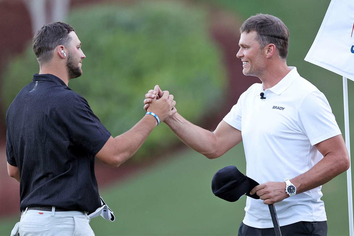 Josh Allen and Tom Brady embrace during Capital One's The Match VI - Brady &amp; Rodgers v Allen &amp; Mahomes at Wynn Golf Club on June 01, 2022 in Las Vegas, Nevada.