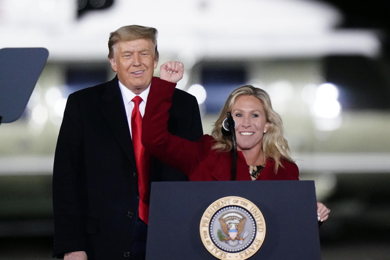 Former President Donald Trump and Rep. Marjorie Taylor Greene. (Brynn Anderson)