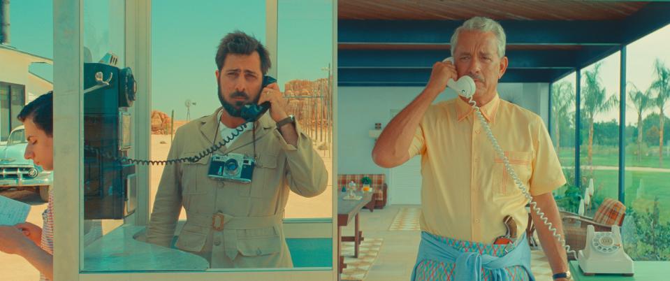 With his son (Jake Ryan, far left) in tow, widowed war photographer Augie (Jason Schwartzman) rings his retired father-in-law (Tom Hanks) in the Wes Anderson comedy "Asteroid City."