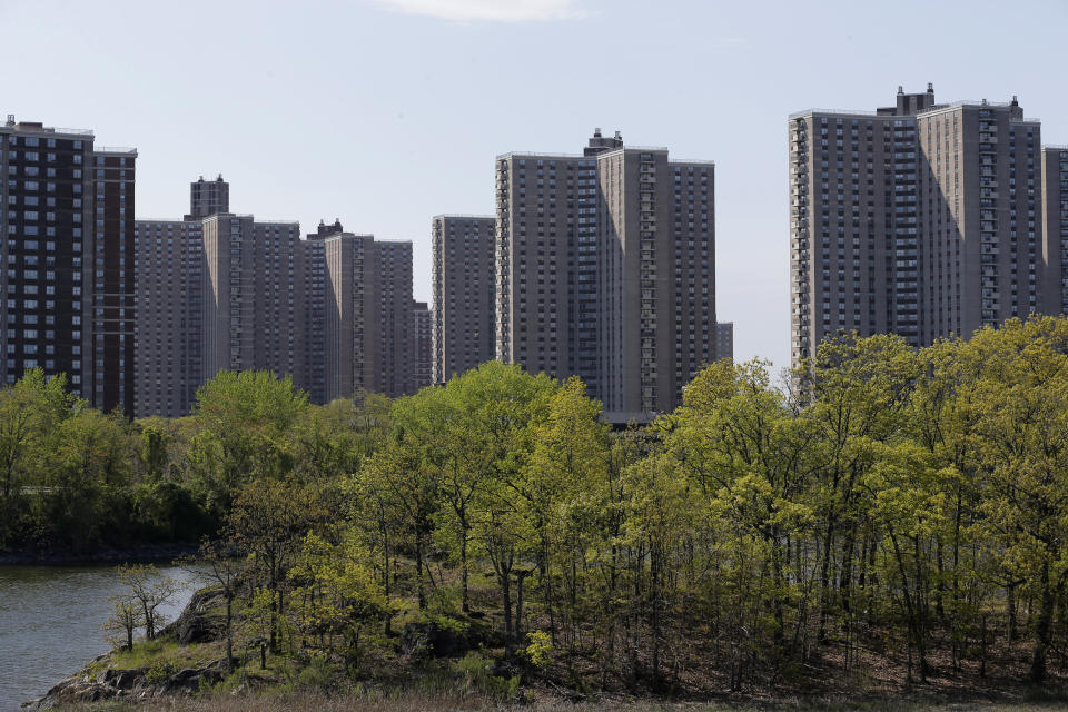 The Hutchinson River meanders by Co-op City in the Bronx borough of New York, Thursday, May 14, 2020. Within the Bronx, almost no place has been hit as hard as Co-op City. Data released by city health officials Monday revealed that the virus has killed at least 155 people living in the zip code that covers the complex. That’s roughly 1 of every 282 residents. (AP Photo/Seth Wenig)