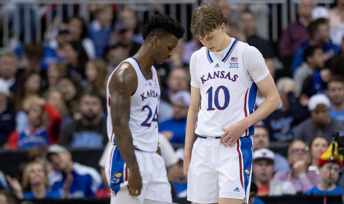 Kansas Jayhawks guard Johnny Furphy (10) and forward K.J. Adams (24) react after giving up a score to the Cincinnati Bearcats during an NCAA basketball game in the Big 12 men’s basketball tournament on Wednesday, March 13, 2024, in Kansas City. Nick Wagner/nwagner@kcstar.com