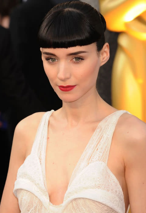 Rooney Mara  Best-actress nominee Rooney Mara went from "Who's that girl?" to red carpet regular with back-to-back David Fincher movies. Response has been mixed: Some great fashion moments mixed with a chilly personality haven't turned her into America's sweetheart. Let's see how she fares if the next "Dragon Tattoo" movie gets green-lit and she grows into her new stature. Meanwhile, she's definitely living life on the A-list with two upcoming high-profile projects: a Steven Soderbergh thriller opposite Channing Tatum called "The Bitter Pill," and the Terrence Malick love triangle drama "Lawless" with Ryan Gosling and Natalie Portman.  Photo By Jeffrey Mayer/WireImage