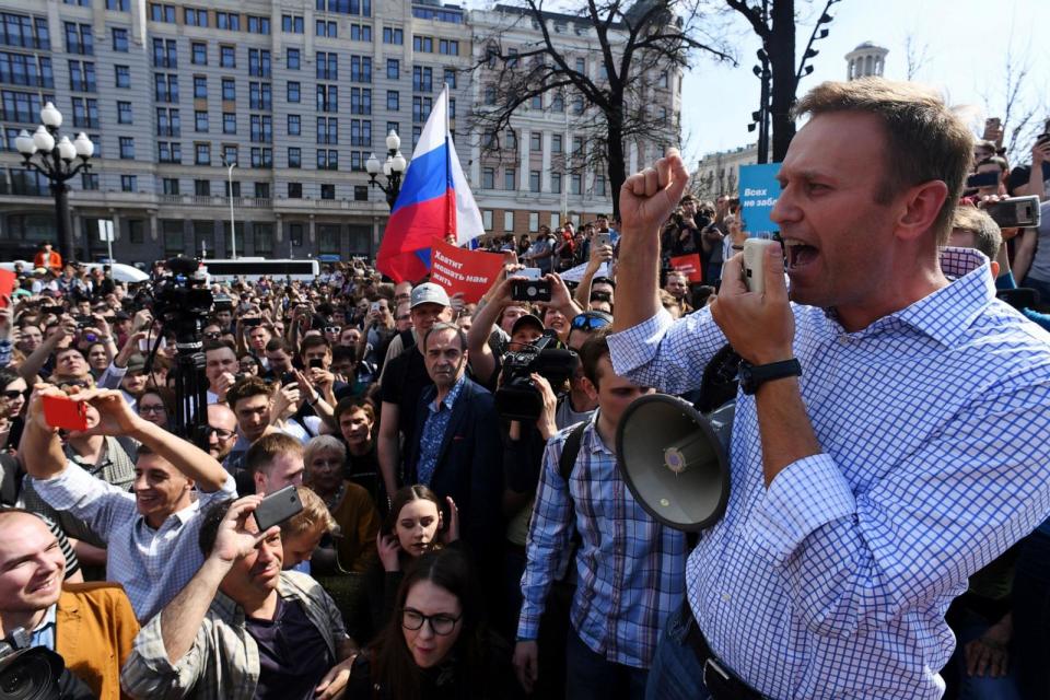 PHOTO: In this May 5, 2018, file photo, Russian opposition leader Alexei Navalny addresses supporters during an unauthorized anti-Putin rally in Moscow, two days ahead of Vladimir Putin's inauguration for a fourth Kremlin term. (Kirill Kudryavtsev/AFP via Getty Images, FILE)