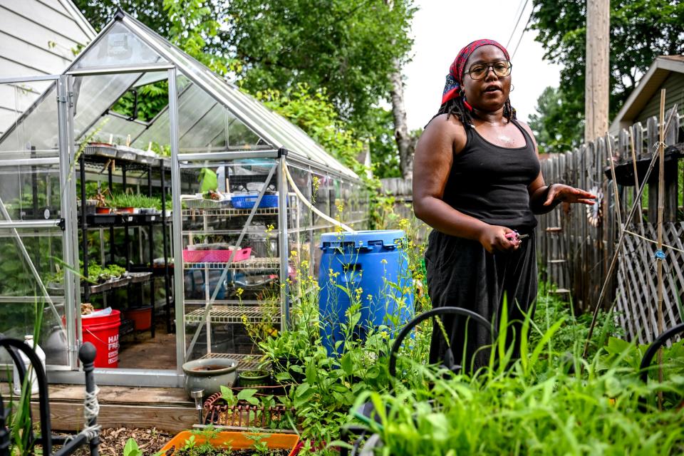 Hillary Coleman, owner of 1991greenery, talks about her urban farm in her garden on Wednesday, June 19, 2024, in Lansing.