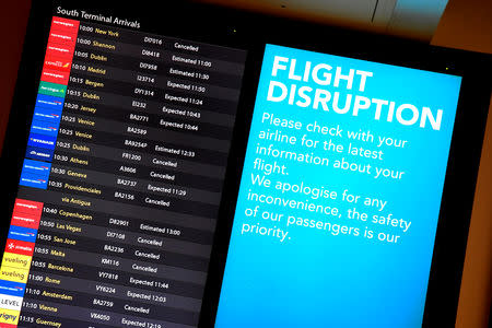 FILE PHOTO: An arrivals board in the South Terminal building at Gatwick Airport, after the airport reopened to flights following its forced closure because of drone activity, in Gatwick, Britain, December 21, 2018. REUTERS/Toby Melville/File Photo