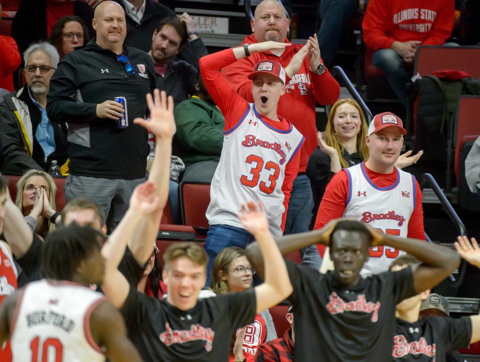 Bradley fans behind the Braves bench celebrate a score against Illinois State in the first half of their Missouri Valley Conference basketball game Saturday, Feb. 3, 2024 at CEFCU Arena in Normal.