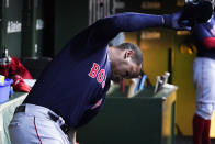 Boston Red Sox's Rafael Devers reacts in the dugout after hitting into a double play during the sixth inning of a baseball game against the Chicago Cubs in Chicago, Saturday, July 2, 2022. Red Sox's Jarren Duran was out at second base and Rafael Devers was out at first. (AP Photo/Nam Y. Huh)
