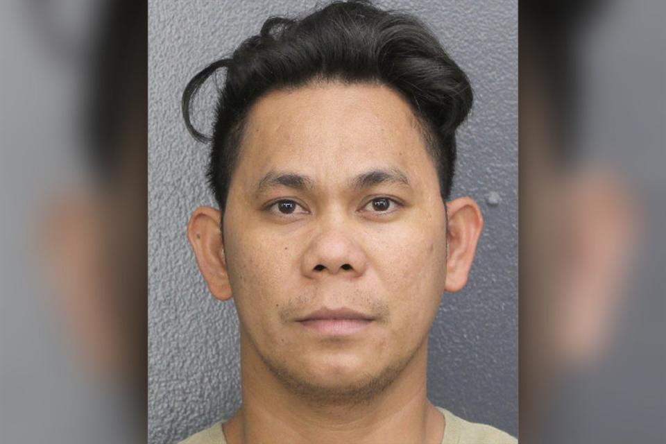 Cris John Pentinio Castor, 35, faces two federal counts of abusive sexual contact of a minor (Broward Sheriff’s Office)