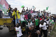 Supporters of Nigeria Labour Party's Presidential Candidate Peter Obi attend a rally in Lagos Nigeria, Saturday, Oct. 1, 2022. Presidential candidates in Nigeria's forthcoming election signed on Thursday, Sept. 29, 2022 an agreement committing to a peaceful campaign for the West African nation's 2023 presidential election.(AP Photo/Sunday Alamba)