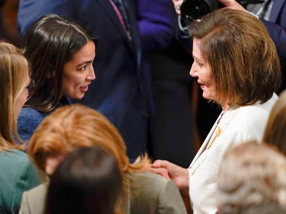 House Speaker Nancy Pelosi of Calif., talks with Rep. Alexandria Ocasio-Cortez, D-N.Y., after Pelosi spoke on the House floor at the Capitol in Washington Thursday, Nov. 17, 2022 (AP)