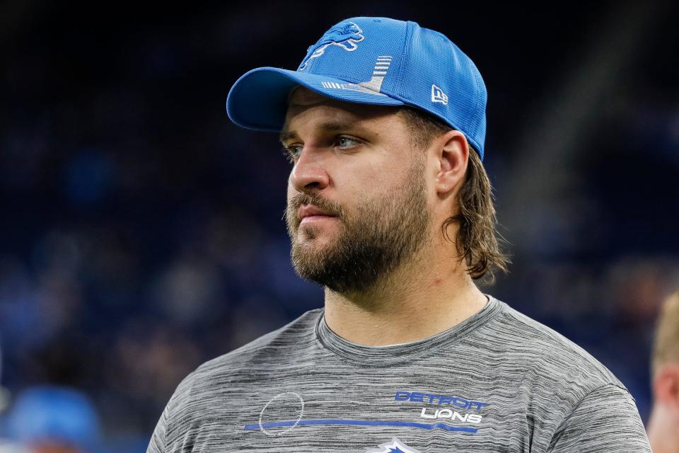 Detroit Lions offensive tackle Taylor Decker (68) walks along the sideline during warmups before the Baltimore Ravens game Ford Field in Detroit on Sunday, Sept. 26, 2021.