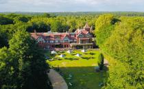 <p>If you're a first-time visitor to the New Forest, you'll really appreciate the magic of <a href="https://www.booking.com/hotel/gb/forestparkhotel.en-gb.html?aid=2070929&label=luxury-new-forest-hotels" rel="nofollow noopener" target="_blank" data-ylk="slk:Forest Park Hotel;elm:context_link;itc:0" class="link ">Forest Park Hotel</a>, where free-roaming ponies, deer and donkeys regularly wander past the windows. </p><p>Once a retreat for royalty and statesmen (yes, even Theodore Roosevelt visited back in 1910), the modern-day version attracts discerning travellers with a mix of fine fare and traditional architecture with modern finishes.</p><p>The addition of a contemporary glass-walled garden room adds another layer of design-driven luxury, beautifully bringing the outside in. Pull up a pew and enjoy an Insta-worthy forest-themed <a href="https://www.redonline.co.uk/travel/g37102406/hotel-afternoon-tea/" rel="nofollow noopener" target="_blank" data-ylk="slk:afternoon tea;elm:context_link;itc:0" class="link ">afternoon tea</a>. Divine.</p><p><a class="link " href="https://www.redescapes.com/offers/new-forest-brockenhurst-forest-park-hotel" rel="nofollow noopener" target="_blank" data-ylk="slk:READ OUR REVIEW AND BOOK;elm:context_link;itc:0">READ OUR REVIEW AND BOOK</a></p><p><a class="link " href="https://www.booking.com/hotel/gb/forestparkhotel.en-gb.html?aid=2070929&label=luxury-new-forest-hotels" rel="nofollow noopener" target="_blank" data-ylk="slk:CHECK AVAILABILITY;elm:context_link;itc:0">CHECK AVAILABILITY</a></p>